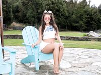 Beautiful teen Lily Adams shows off her tasty pussy with view of the mountains