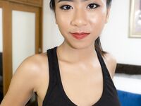 Thai beauty Som shows more than just PornHub tank top