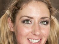 Tied up blonde Sheena Shaw is teased on the wall