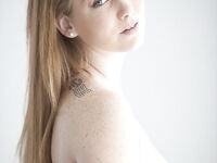 Redhead Bre Phoenix uncovers her perfect natural tits